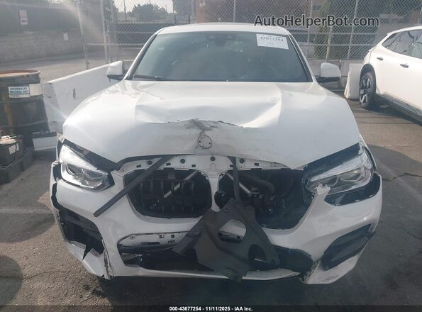 5UX2V1C06M9E92547 2021 BMW X4 White Dashboard view