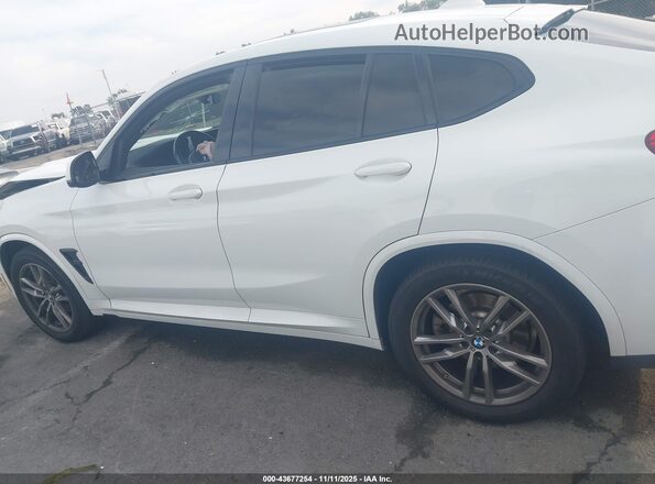 5UX2V1C06M9E92547 2021 BMW X4 White Rear interior view