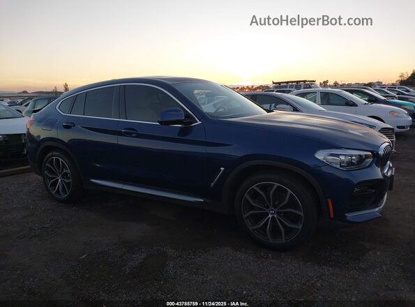 5UX2V1C07L9B50328 2020 BMW X4 Blue Սալոնի հետևի տեսք