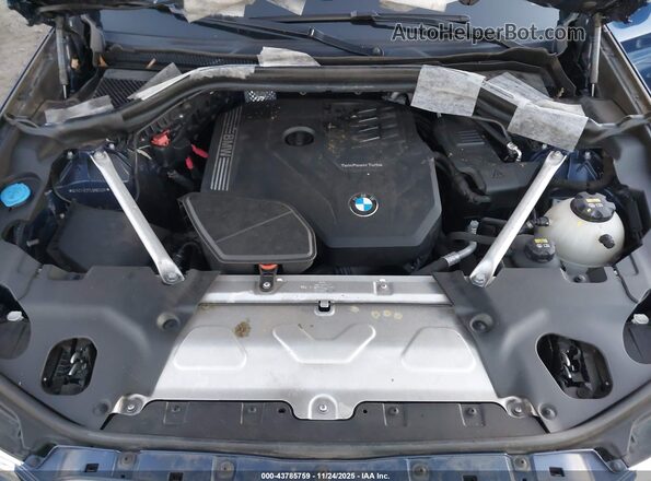 5UX2V1C07L9B50328 2020 BMW X4 Blue Հետևի տեսք