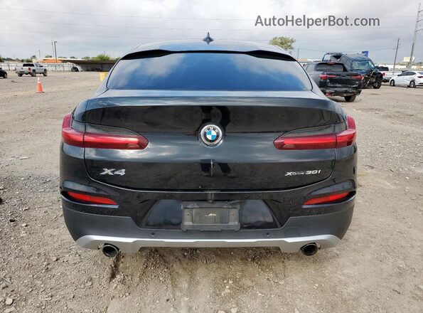 5UX2V1C07M9H76334 2021 BMW X4 Black Vista trasera