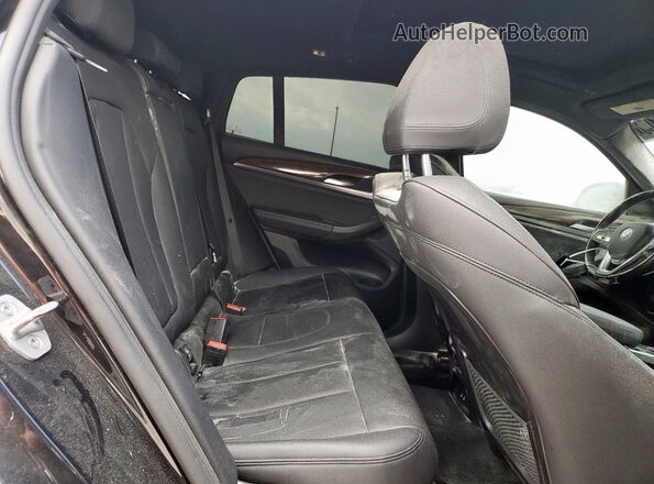 5UX2V1C07M9H76334 2021 BMW X4 Black Vista interior trasera