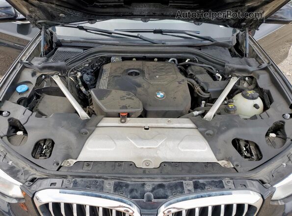 5UX2V1C07M9H76334 2021 BMW X4 Black Vista del compartimento del motor