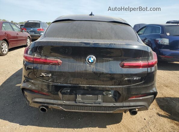 5UX2V1C09M9F07686 2021 BMW X4 Black Widok z tyłu