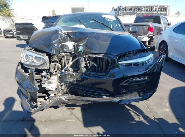 5UX2V1C0XM9E46199 2021 BMW X4 Black Սալոնի հետևի տեսք