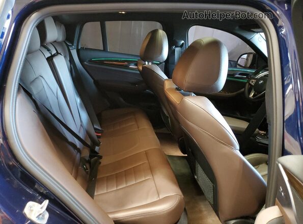 5UX33DT06N9J98236 2022 BMW X4 Blue Вид задньої частини салону
