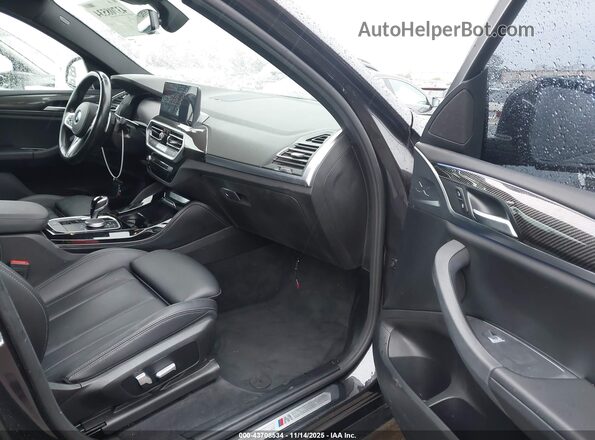 5UX33DT09N9J09596 2022 BMW X4 Black Vista interior delantera