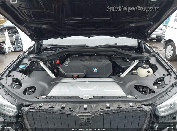 5UX33DT09N9J09596 2022 BMW X4 Black Vista trasera
