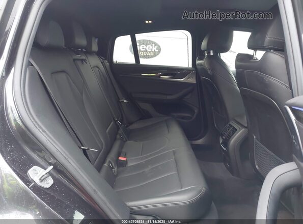5UX33DT09N9J09596 2022 BMW X4 Black Vista de la etiqueta del VIN