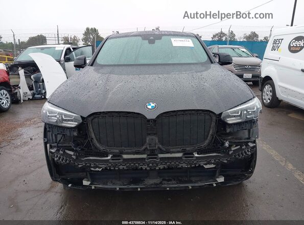 5UX33DT09N9J09596 2022 BMW X4 Black Vista interior trasera