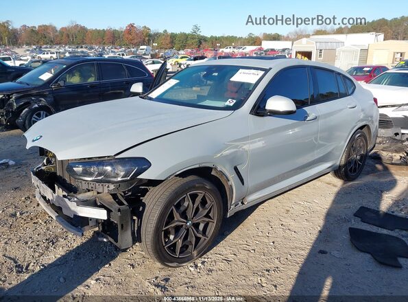 5UX33DT09P9P11689 2023 BMW X4 Gray Vista tres cuartos delantera izquierda