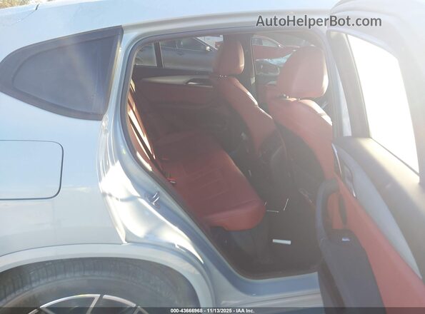 5UX33DT09P9P11689 2023 BMW X4 Gray Vista de la etiqueta del VIN