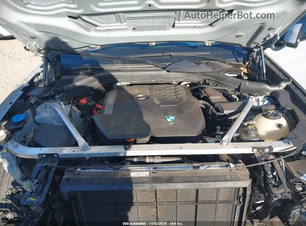 5UX33DT09P9P11689 2023 BMW X4 Gray Vista trasera