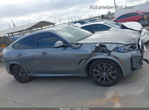 5UX33EX00R9U24194 2024 BMW X6 Серый Вид задней части салона