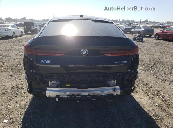 5UX33EX01R9S21573 2024 BMW X6 Black Rear view