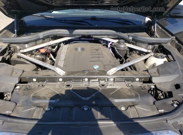 5UX33EX01R9S21573 2024 BMW X6 Black Rear interior view