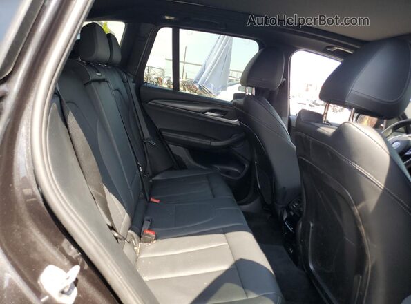 5UX43DP00R9X32626 2024 BMW X3 Gray Rear interior view