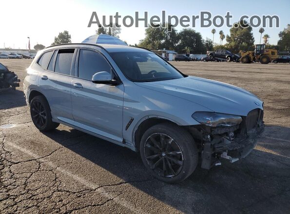 5UX43DP01P9P15976 2023 BMW X3 Gray Front right