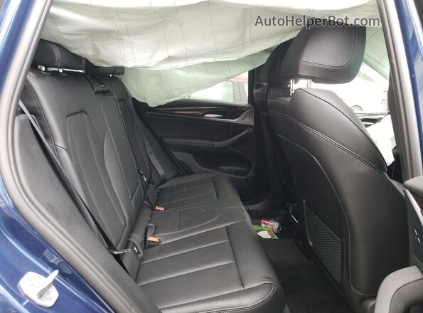 5UX43DP06P9P39691 2023 BMW X3 Синий Вид задней части салона