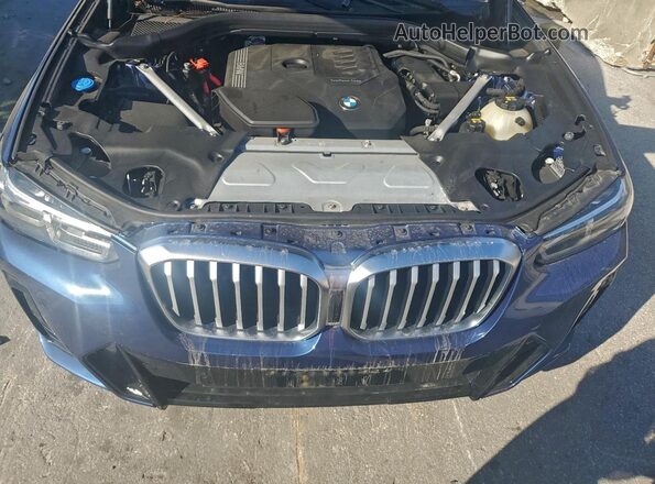 5UX43DP08N9K27038 2022 BMW X3 Blue Вид підкапотного простору
