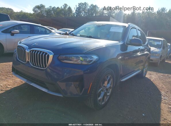 5UX43DP08N9M21200 2022 BMW X3 Blue Առջևի ձախ երեք քառորդ տեսարան