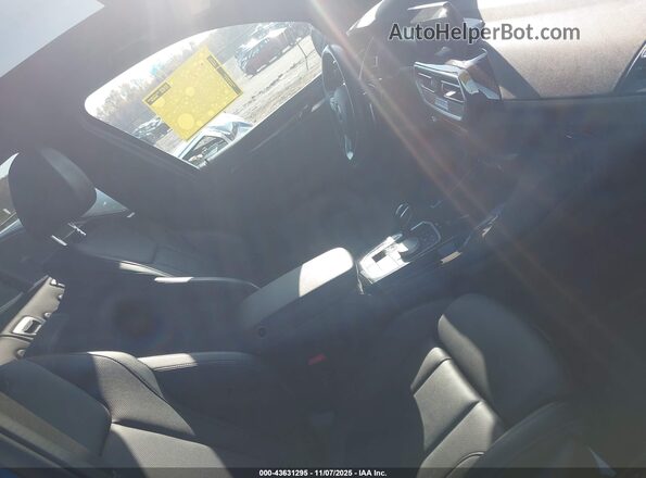 5UX43DP08R9U64053 2024 BMW X3 Blue Вид салону спереду