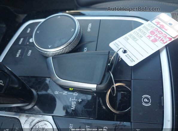 5UX43DP08R9U64053 2024 BMW X3 Blue Вид панелі приладів