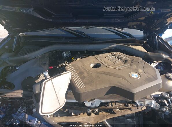 5UX43DP08R9U64053 2024 BMW X3 Blue Вид ззаду