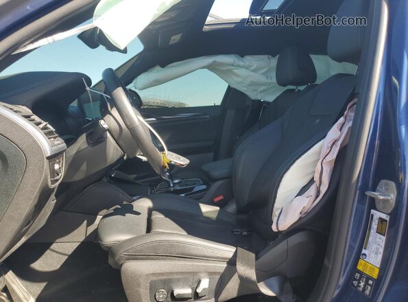 5UX43DT05P9P82134 2023 BMW X4 Brown Vista interior delantera