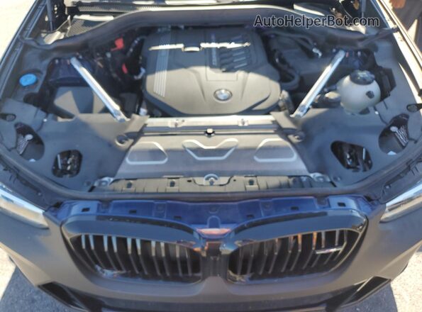 5UX43DT05P9P82134 2023 BMW X4 Brown Vista del compartimento del motor