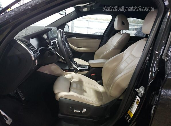 5UX43DT09P9P93153 2023 BMW X4 Black Vista interior delantera