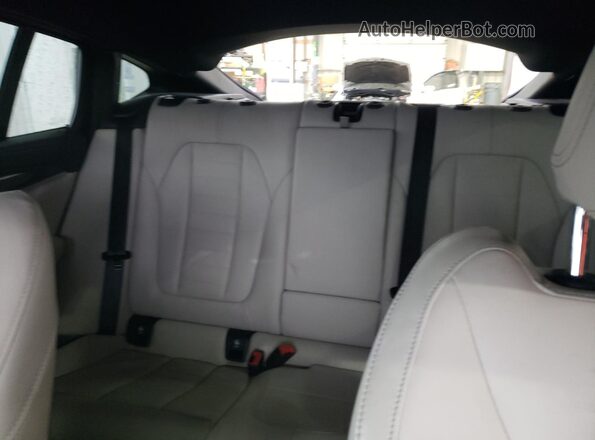 5UX43DT09P9P93153 2023 BMW X4 Black Vista de los asientos traseros