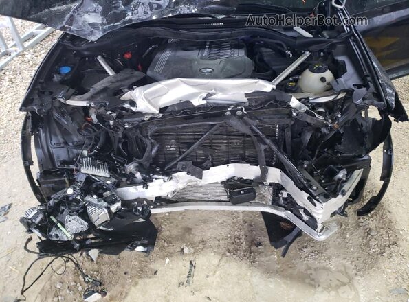 5UX43DT09P9P93153 2023 BMW X4 Black Vista del compartimento del motor
