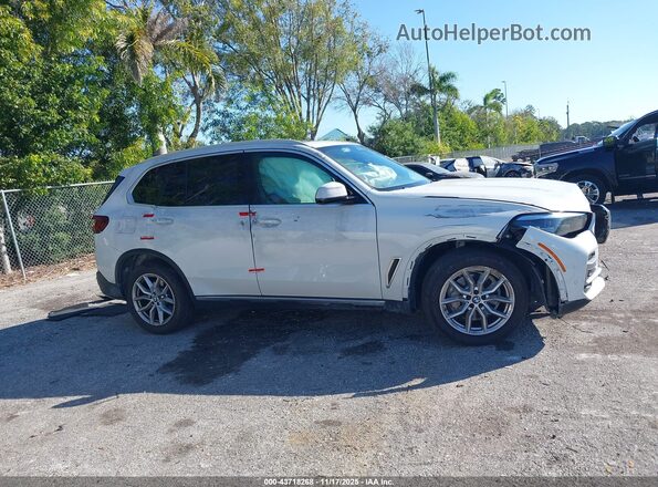 5UXCR6C01P9P47998 2023 BMW X5 White Սարքավորումների վահանակի տեսք