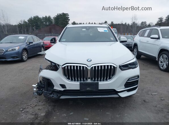 5UXCR6C04M9F10226 2021 BMW X5 White ხელსაწყოთა პანელის ხედი