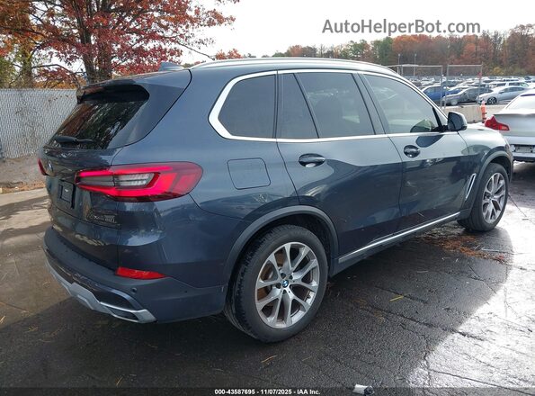 5UXCR6C06N9M28271 2022 BMW X5 Navy Tył prawy