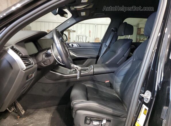 5UXCR6C06P9R96829 2023 BMW X5 Black Front interior view