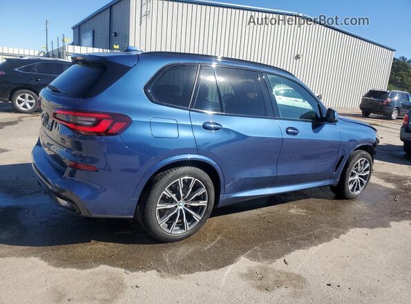5UXCR6C08P9P10382 2023 BMW X5 Blue Trasero derecho