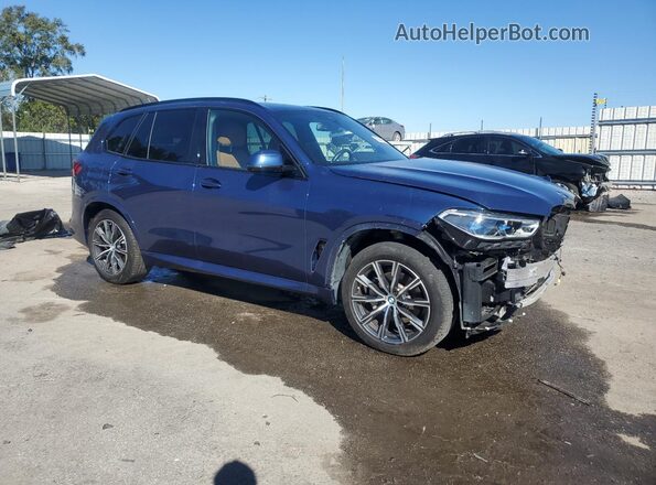5UXCR6C08P9P10382 2023 BMW X5 Blue Delantero derecho