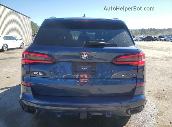 5UXCR6C08P9P10382 2023 BMW X5 Blue Vista trasera
