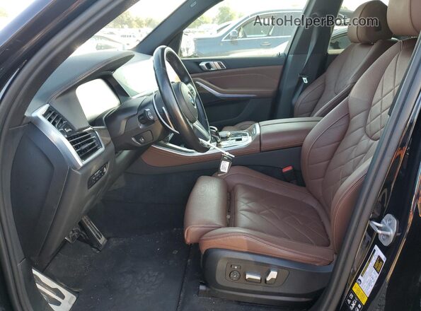 5UXCR6C08P9P77466 2023 BMW X5 Black Vista interior delantera