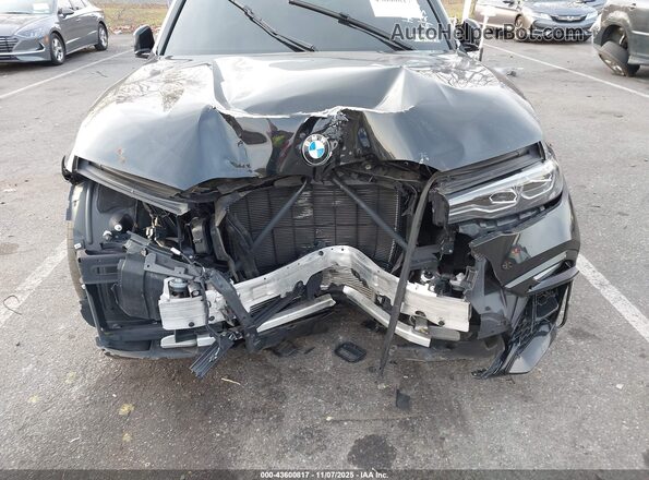 5UXCW2C06N9L13252 2022 BMW X7 Black Вид спереду