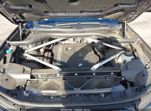 5UXCW2C06N9M25193 2022 BMW X7 Gray Rear view