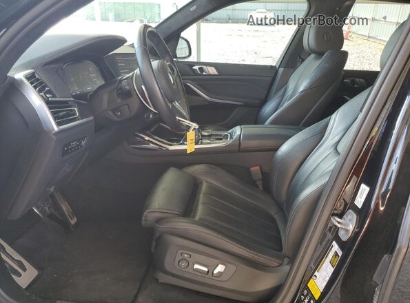 5UXCW2C07L9B87418 2020 BMW X7 Черный Вид салона спереди