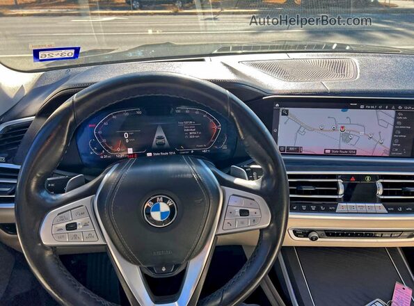 5UXCW2C07M9E79121 2021 BMW X7 Gray Vista interior delantera