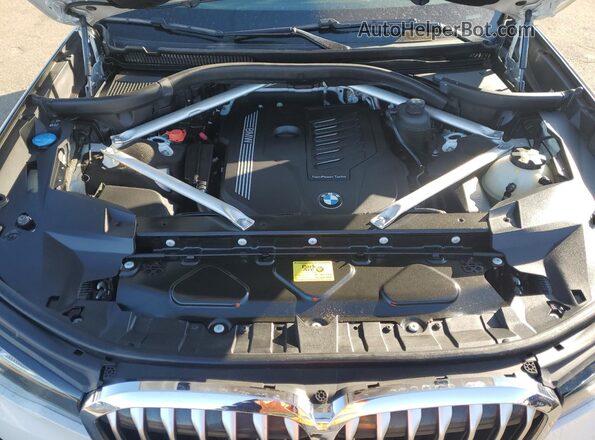 5UXCW2C08L9C31622 2020 BMW X7 White Շարժիչի բաժամունքի տեսք