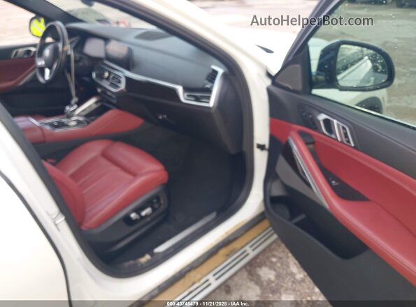 5UXCY4C06L9D17744 2020 BMW X6 White Widok wnętrza z przodu