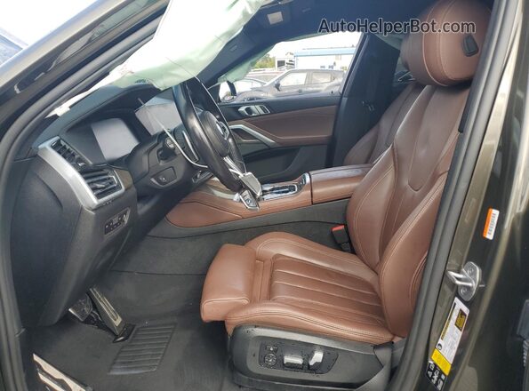 5UXCY6C05M9F89067 2021 BMW X6 Green Widok wnętrza z przodu