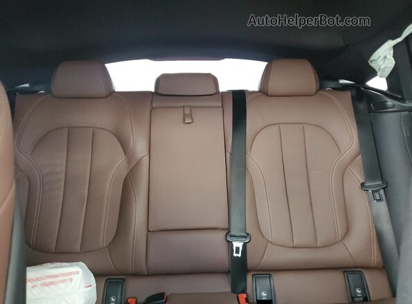 5UXCY6C05M9F89067 2021 BMW X6 Green Widok tylnych siedzeń