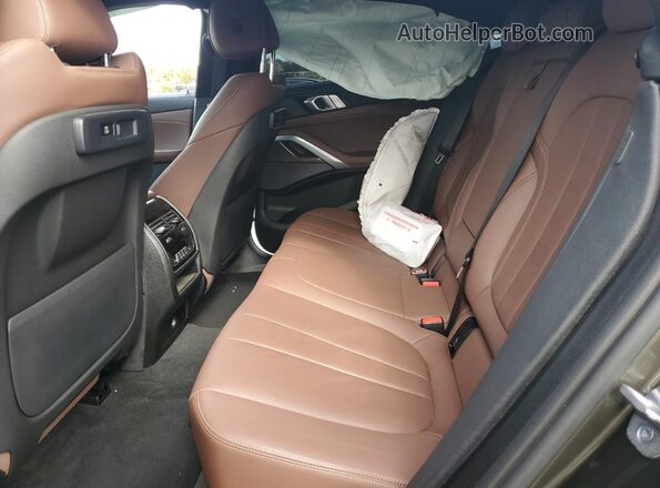 5UXCY6C05M9F89067 2021 BMW X6 Green Widok wnętrza z tyłu